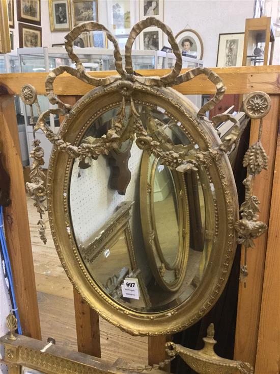 Small gilt oval Adams style wall mirror